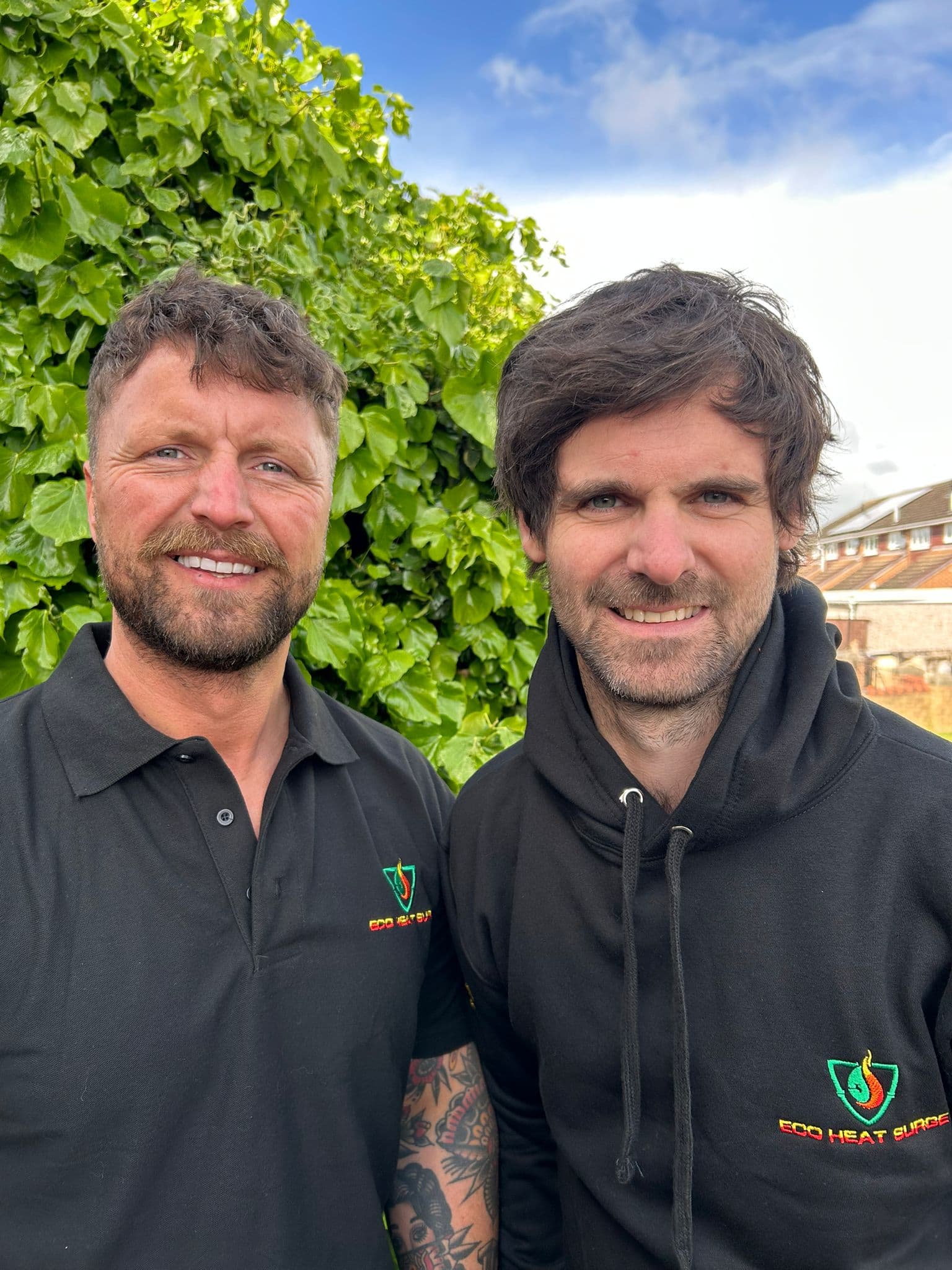 Adam Pearson and Danny Harper, founders of Eco Heat Surge, in Eco Heat Surge branded workwear